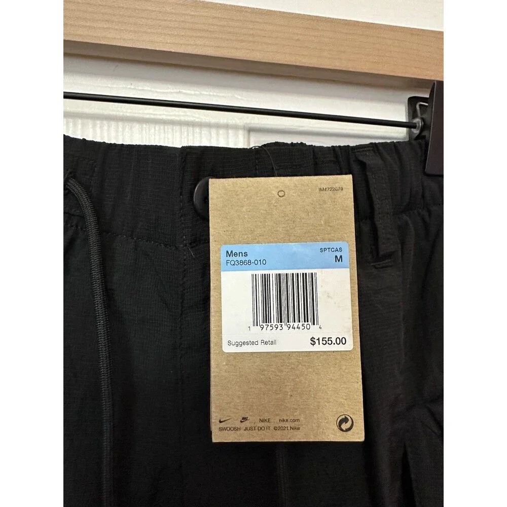 Size M Nike Mens Repel Tech Pack Lined Loose Taper Fit Pant Black FQ3868-010 NEW